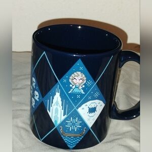 Disney Frozen ceramic coffee mug with a cross-stitch design. Collectors Edition.